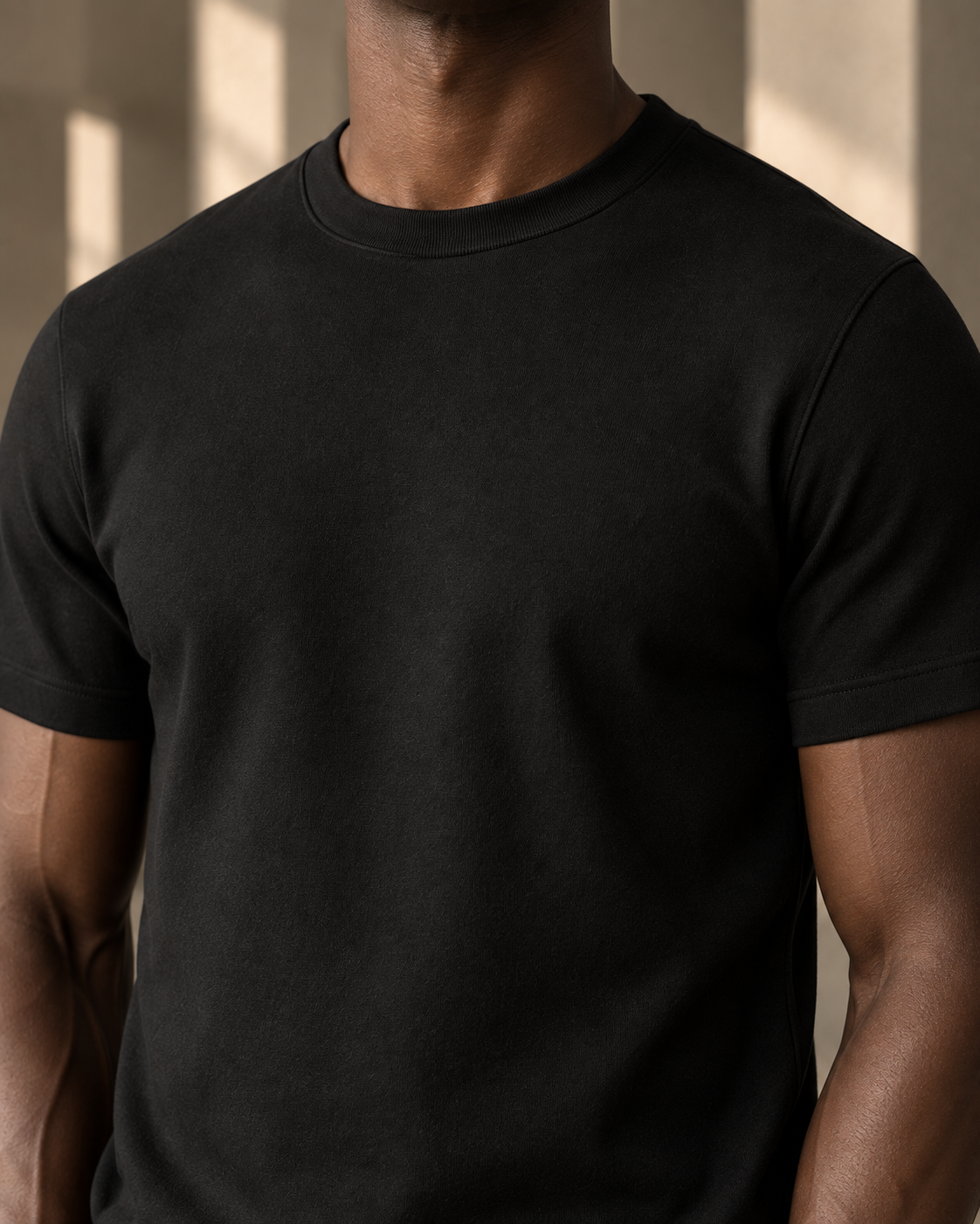The Essential worn close to the body, showing its structured neckline and sleeve shape