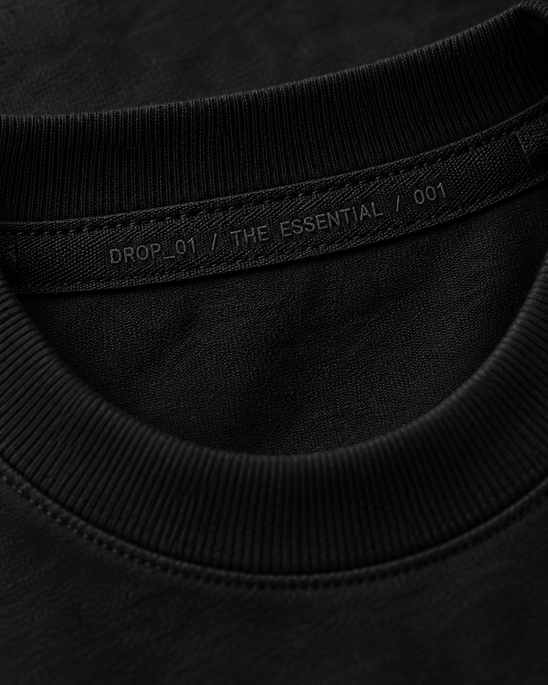 Woven Drop 01 identity inside the neckline